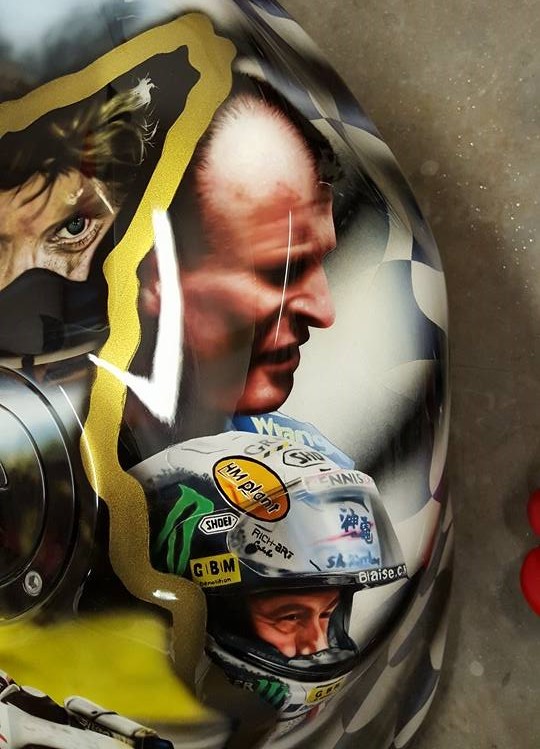 Airbrushed Painting of Isle of Mann TT racers on side of petrol Tank